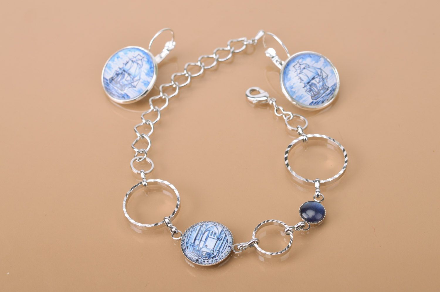 Handmade set of metal jewelry earrings and bracelet with print in nautical style photo 2