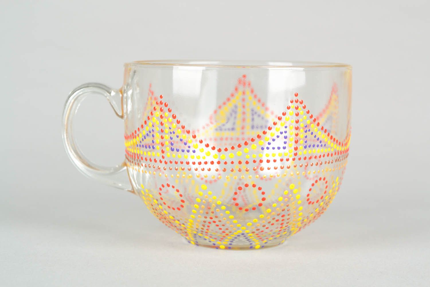 Clear glass8 oz tea cup with handle and red, yellow dot pattern photo 3