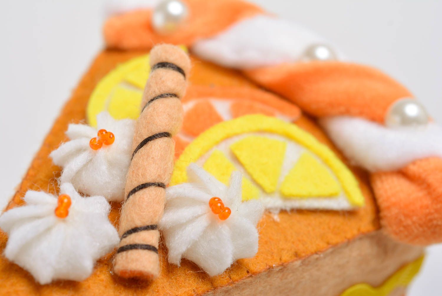 Handmade designer soft pincushion sewn of colorful felt piece of cake photo 2