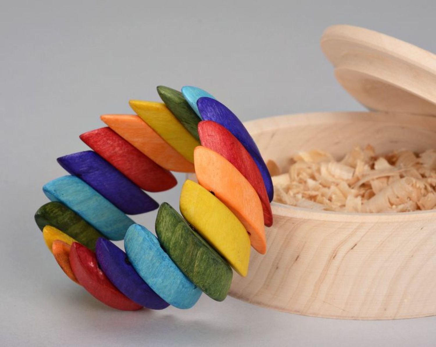 Bright multi-colored wrist bracelet made from wood photo 1