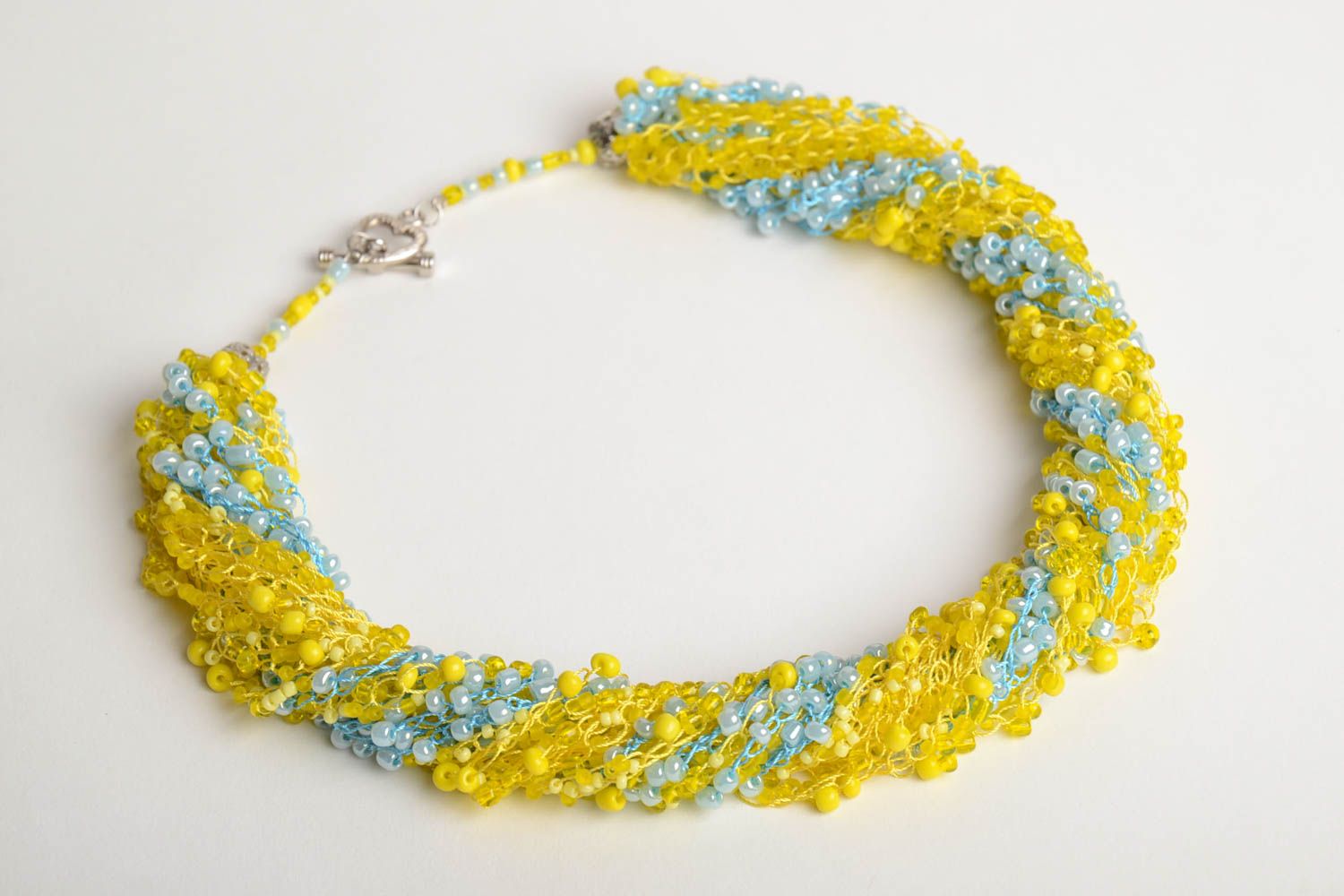 Multirow long handmade airy woven beaded necklace of yellow color photo 3