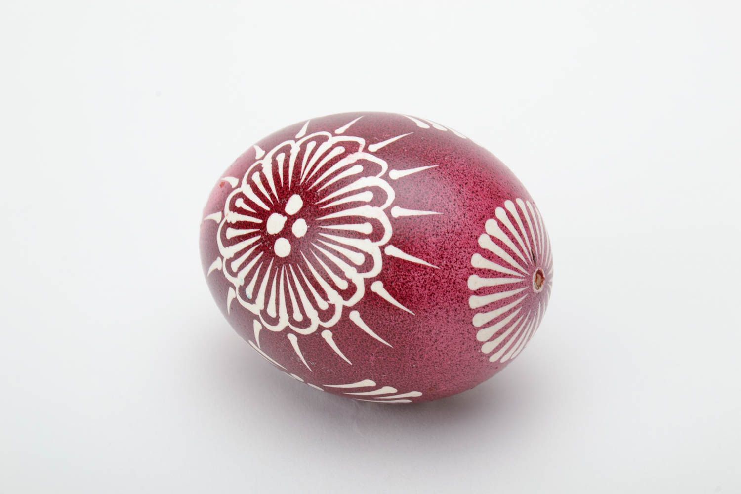 Red and white handmade designer painted Easter egg ornamented using waxing technique photo 4