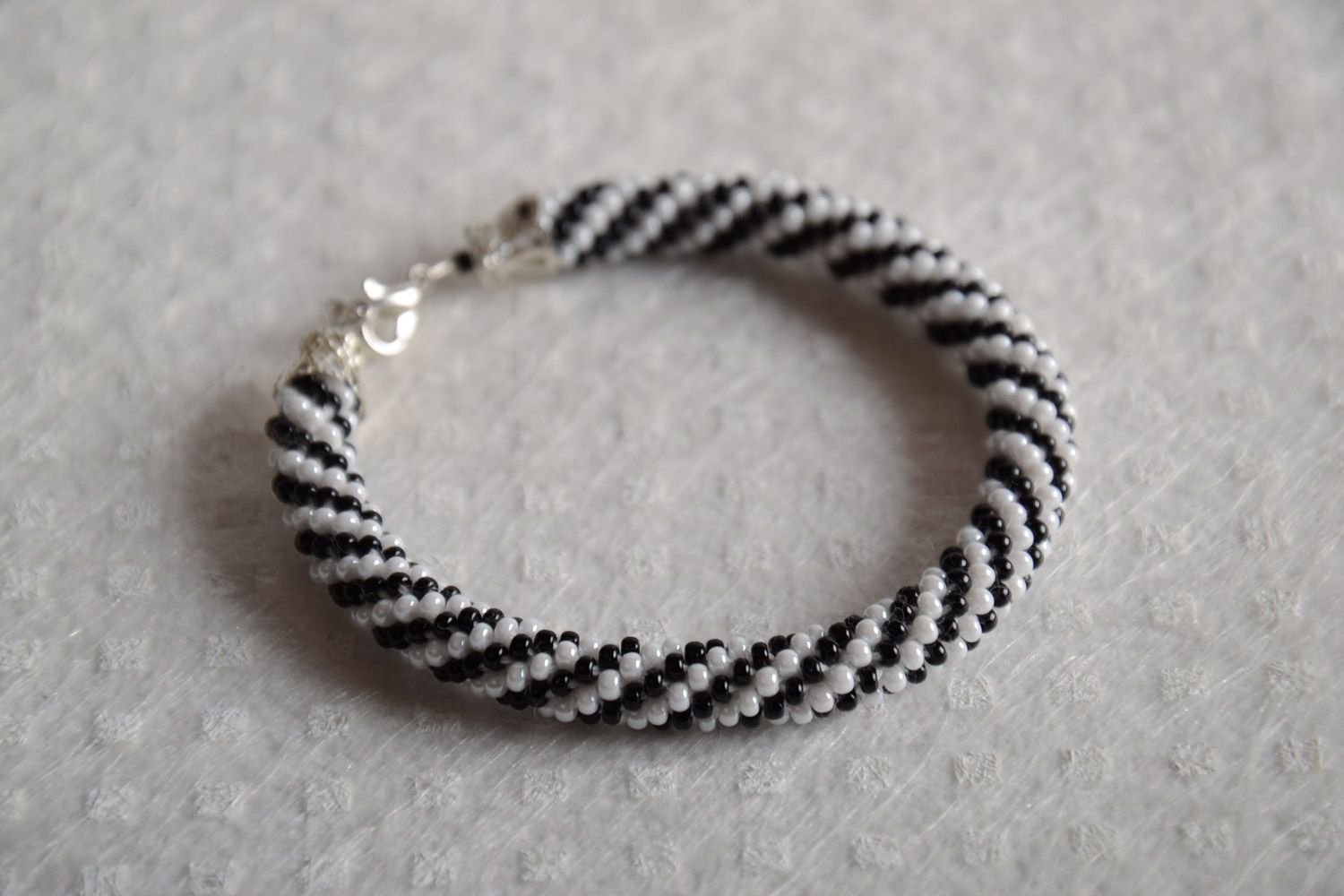 Handmade beautiful wrist bracelet made of Czech beads black and white for women photo 1
