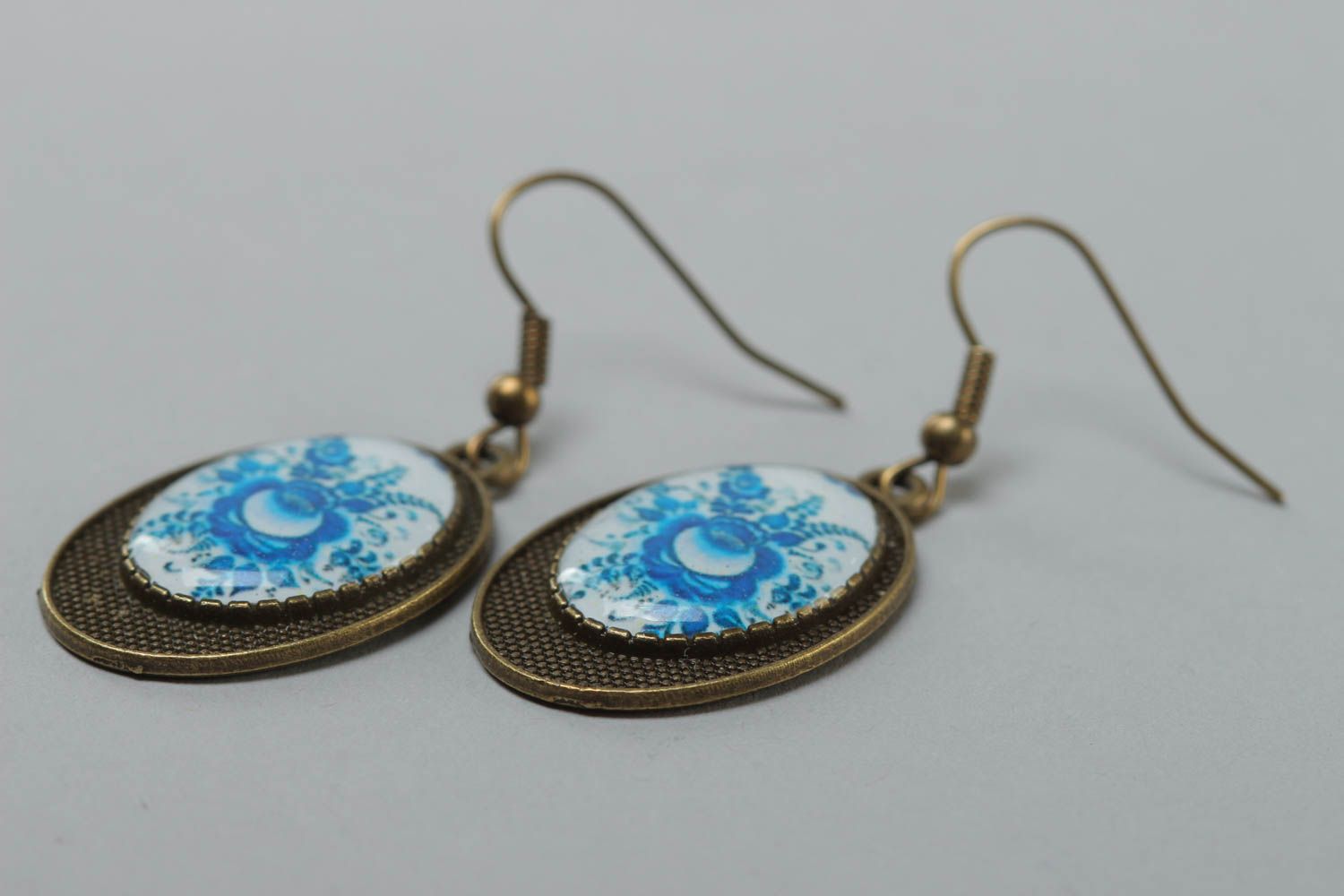 Handmade designer oval dangling earrings with metal basis and glass like glaze photo 3