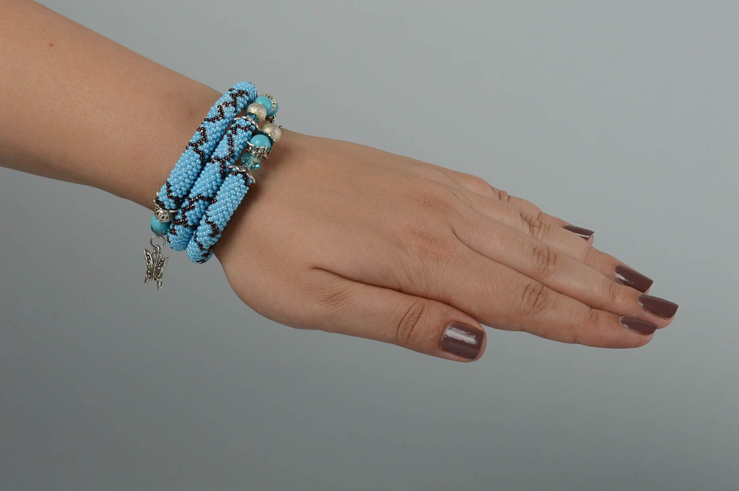 Turquoise beads cord bracelet with metal butterfly charm photo 6