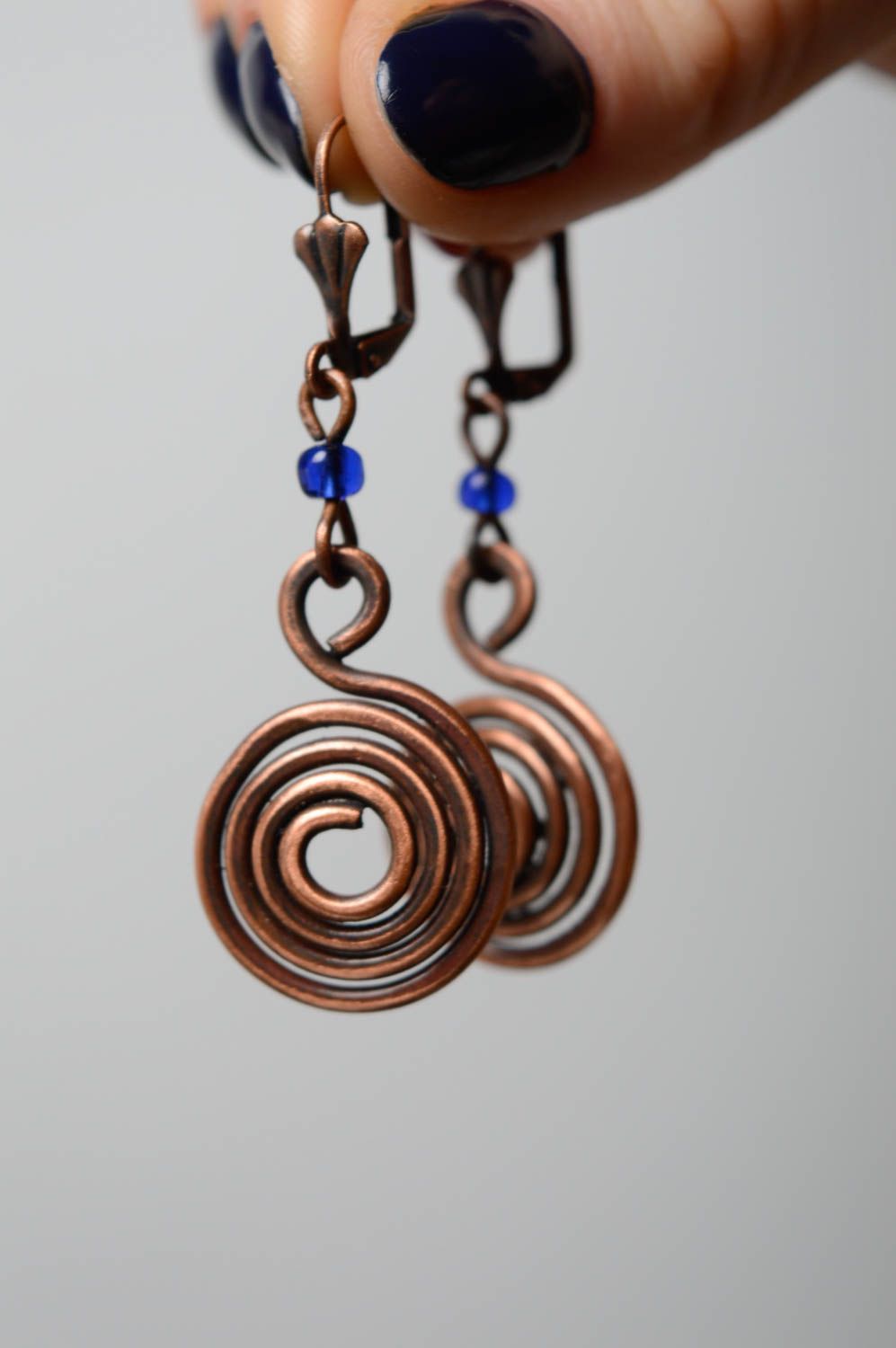 Copper wire wrap earrings in the shape of curls photo 5