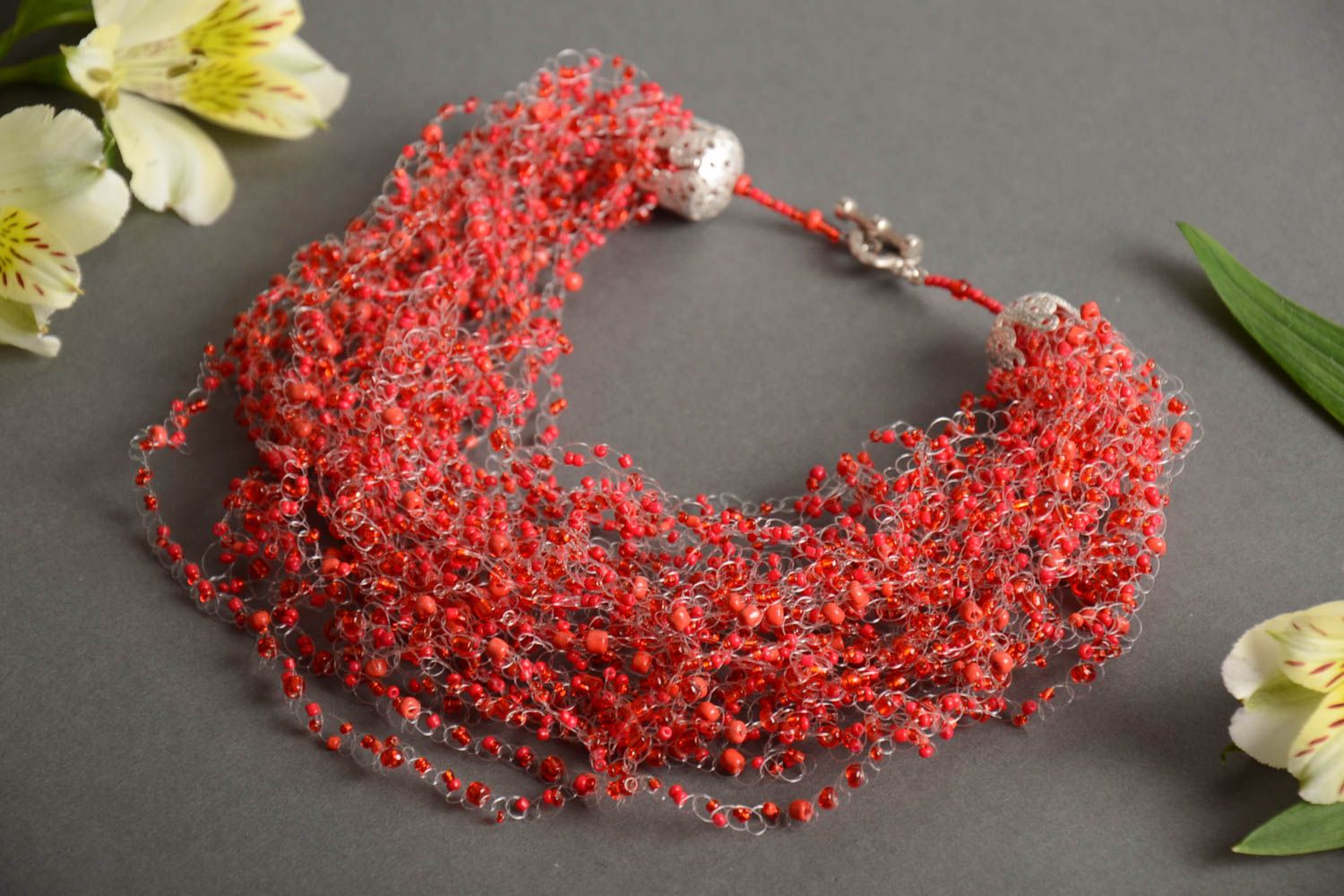 Designer handmade multi row airy crocheted beaded necklace in red color shades photo 1