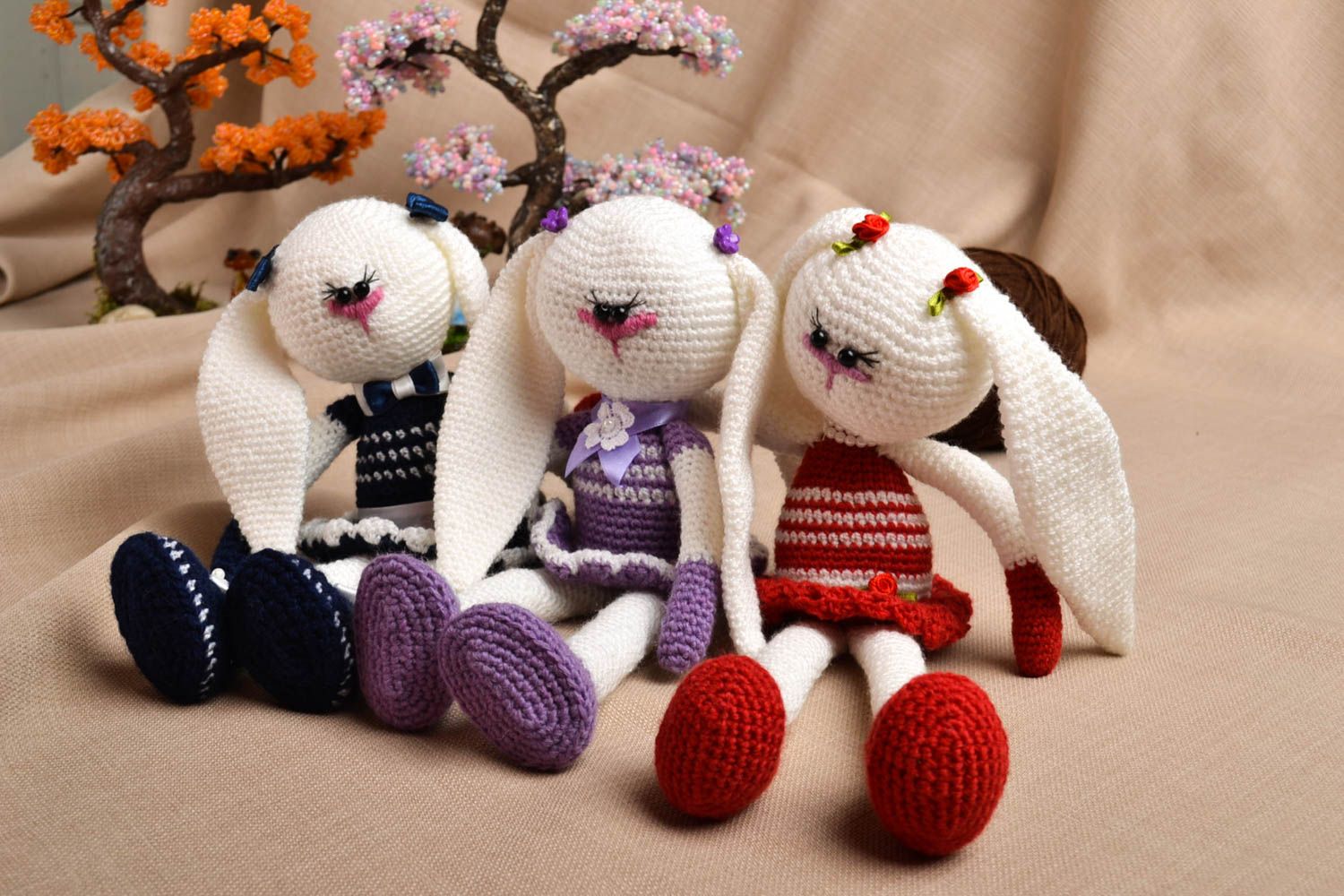 Set of three hand knitted stuffed plush rabbits in white red purple color 11,83,9 inches photo 1