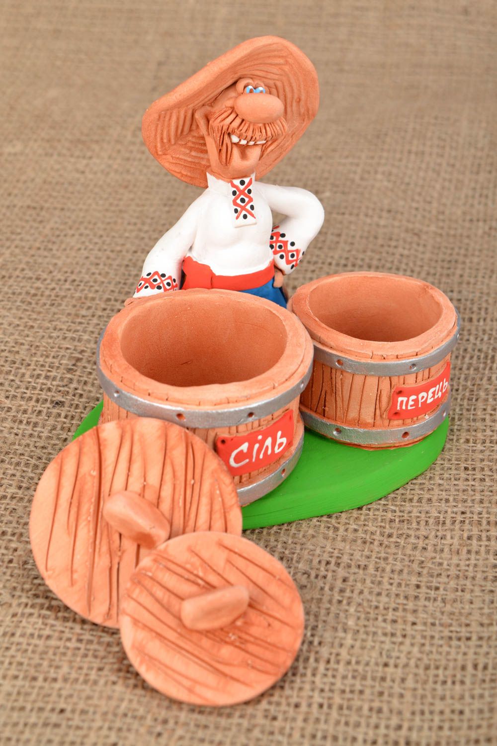 Handmade salt and pepper ceramic stand in the shape of a village man with two jars 1 lb photo 1