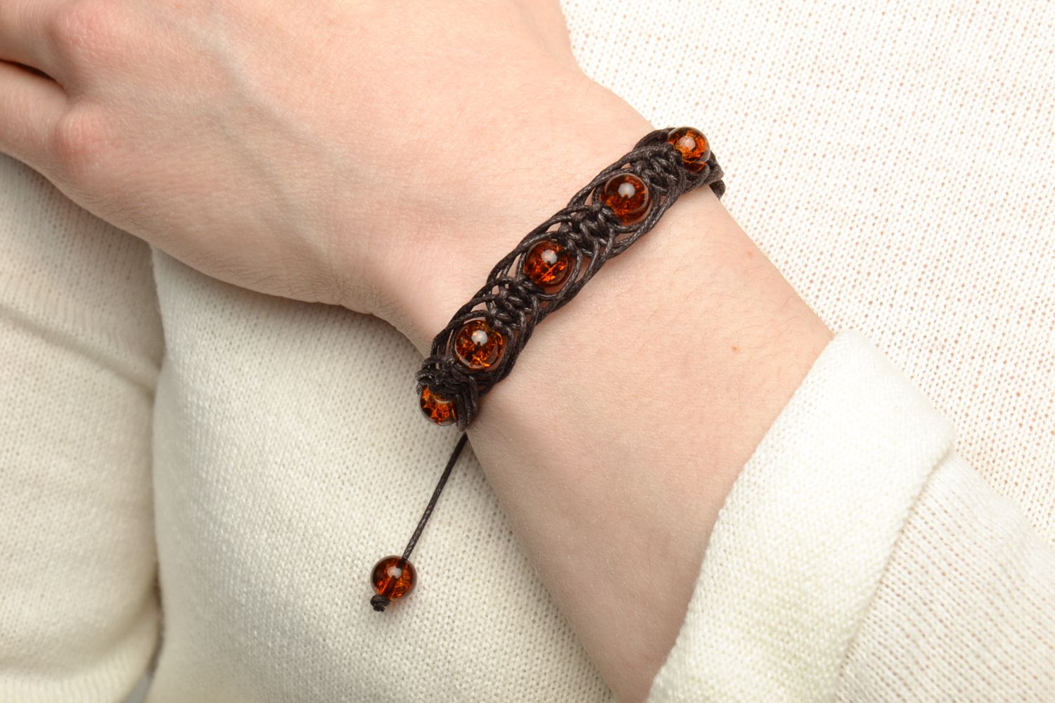 Bracelet with glass beads of amber color photo 5