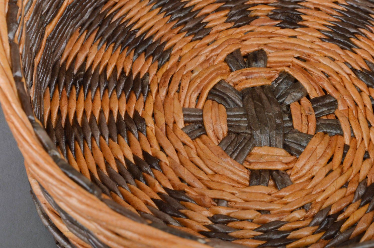 Handmade round brown decorative basket woven of paper rod for interior  photo 3