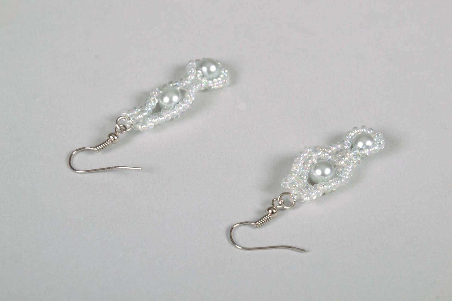 White earrings with artificial pearls photo 4