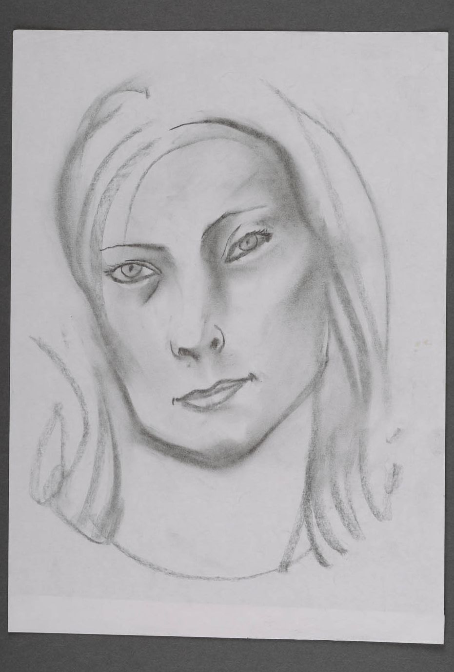 Woman's portrait drawn with black graphite photo 1