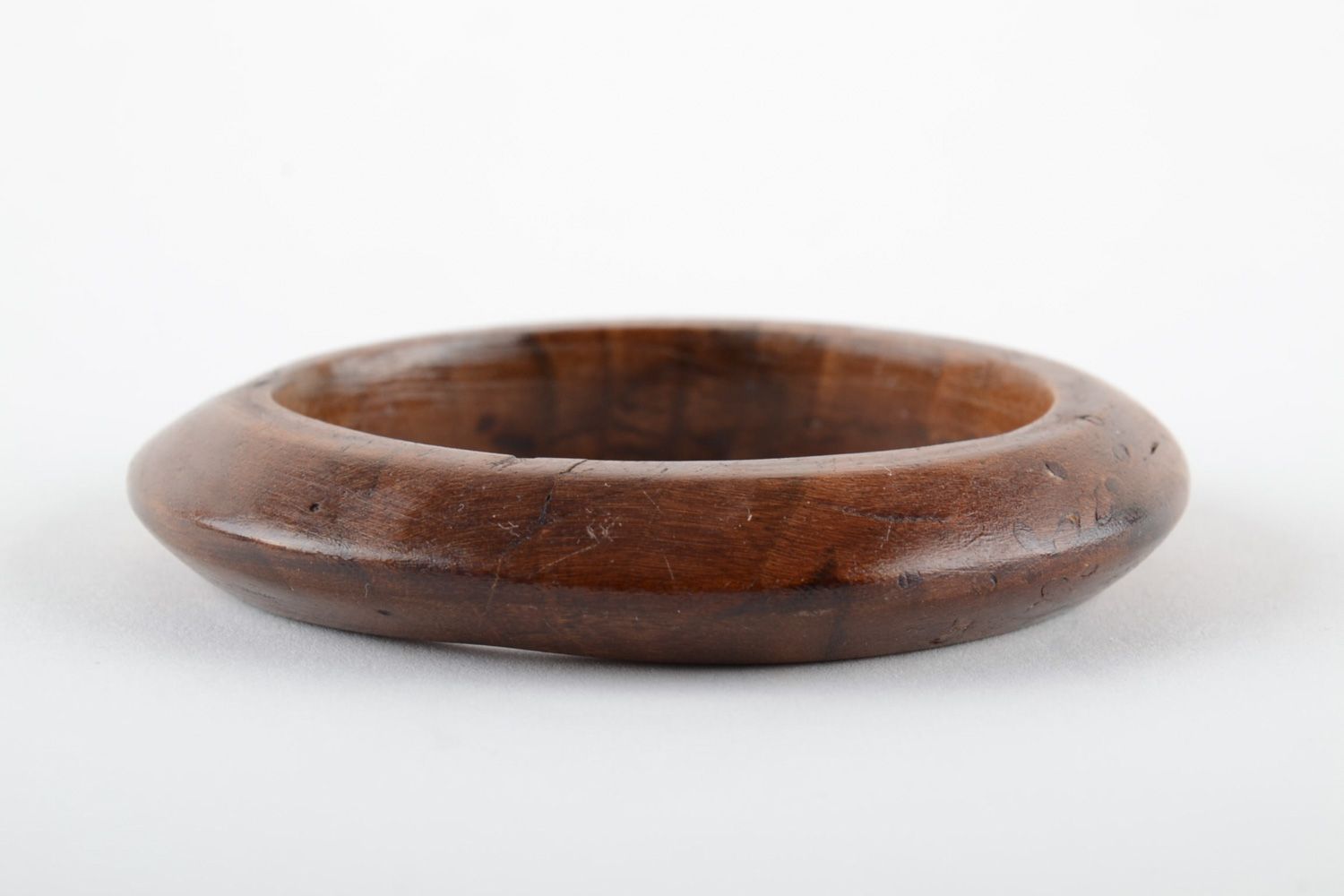 Elegant thin handmade wrist bracelet carved of wood and varnished for women photo 2