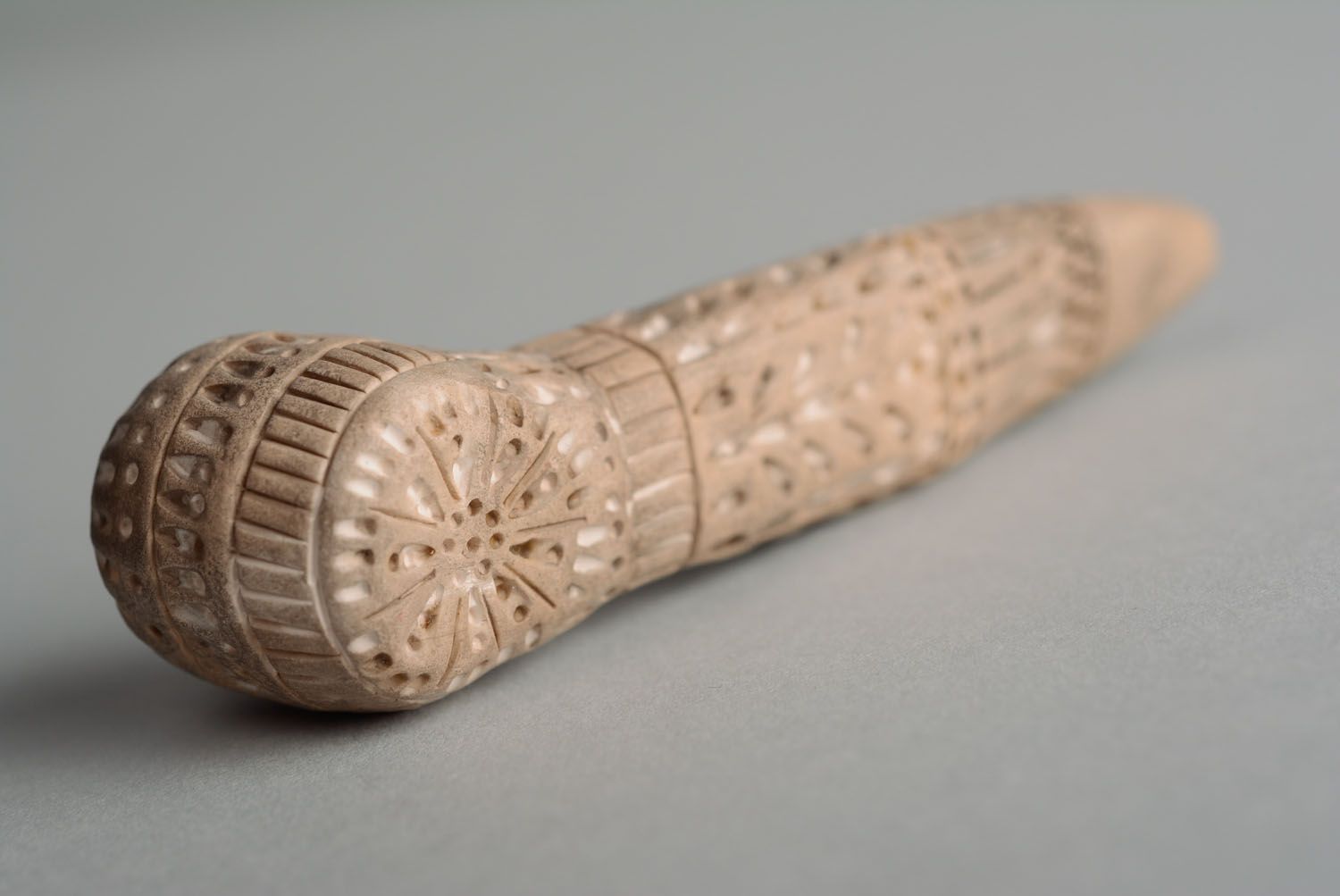 Clay smoking pipe in ethnic style photo 5