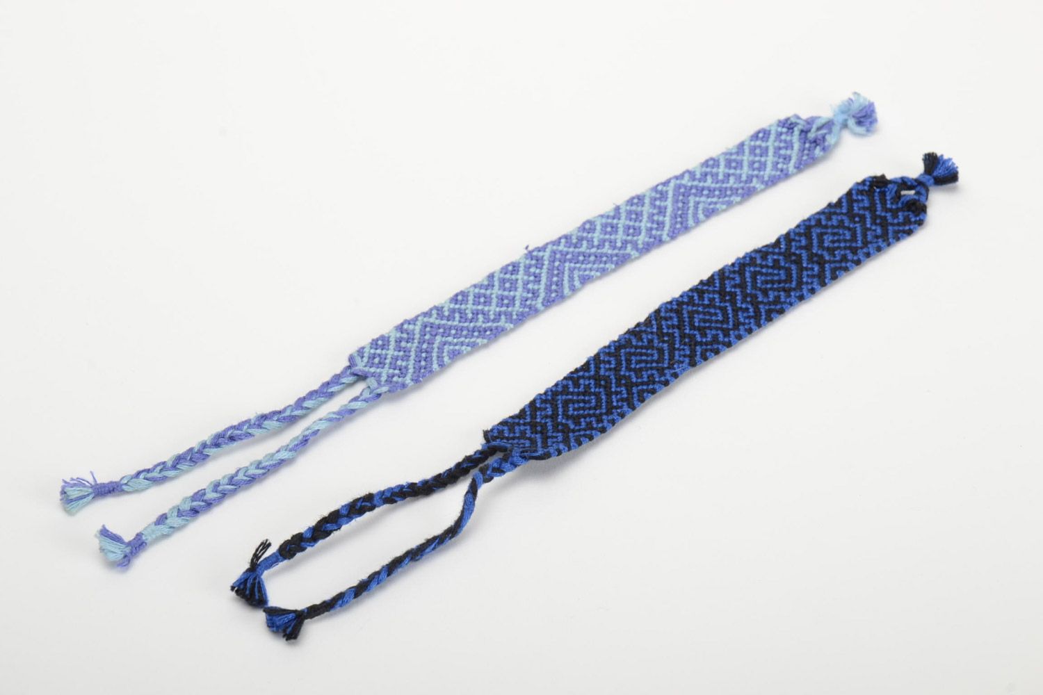 Set of 2 handmade thread friendship wrist bracelets of blue color in ethnic style photo 2