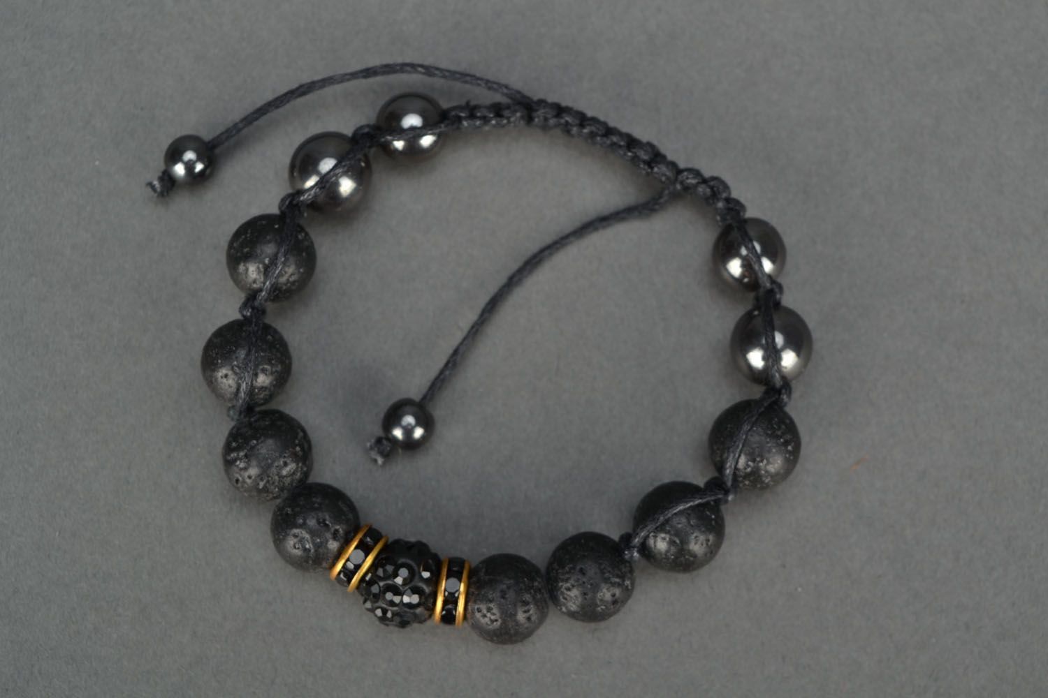 Handmade bracelet with volcanic lava beads photo 2