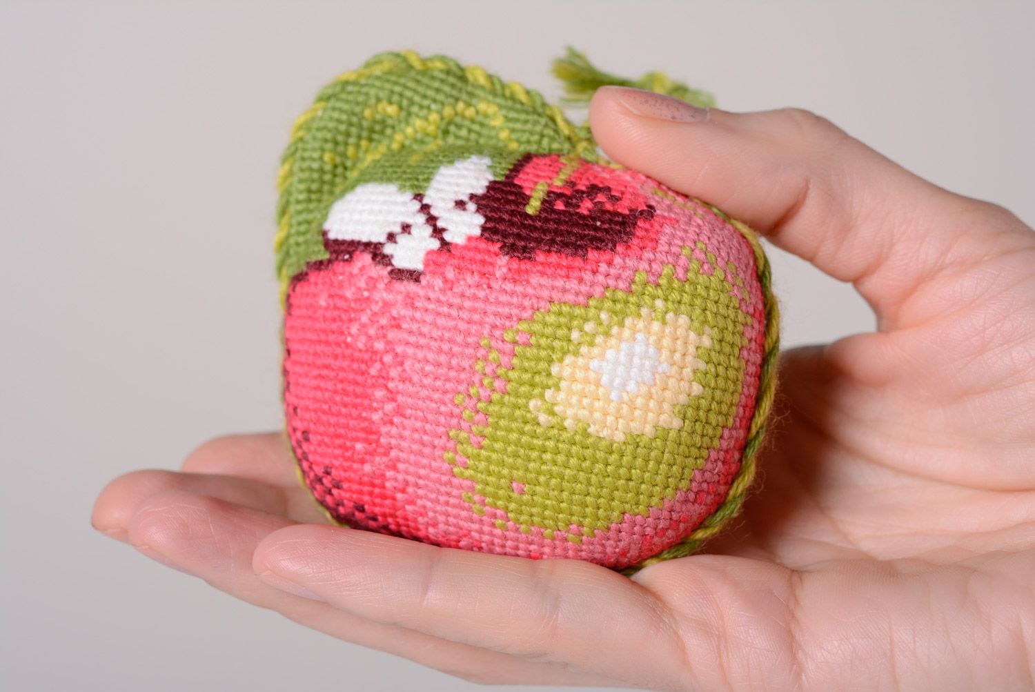 Handmade soft pincushion in the shape of apple with cross stitch embroidery photo 3