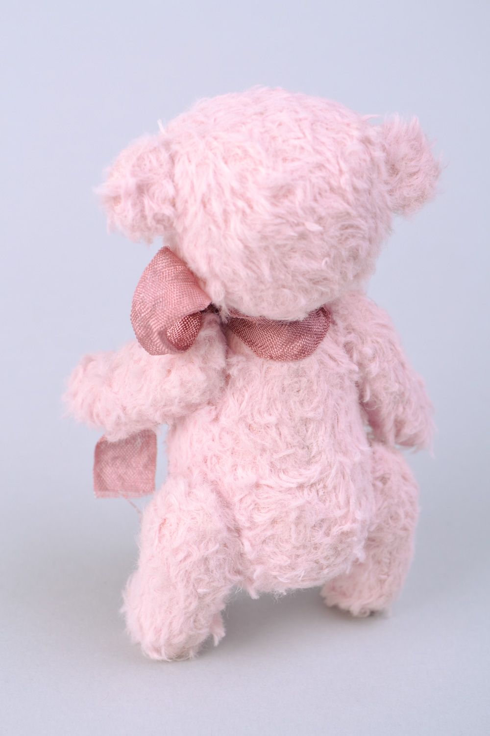 Small handmade designer soft toy bear of pink color with beautiful bow photo 5