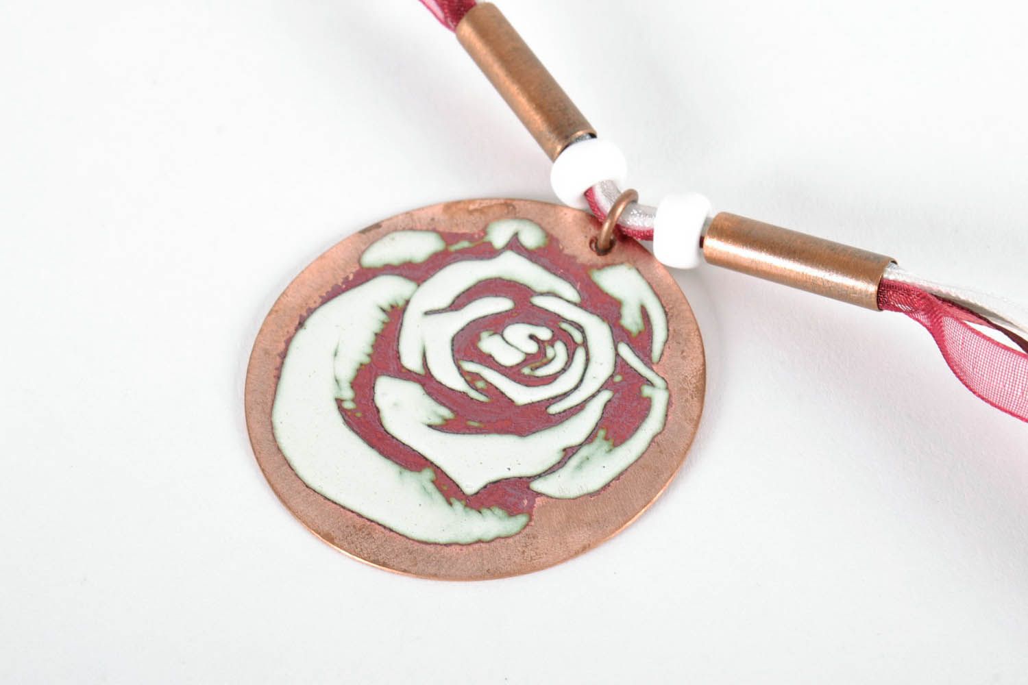Pingente artesanal de cobre Rosa foto 1