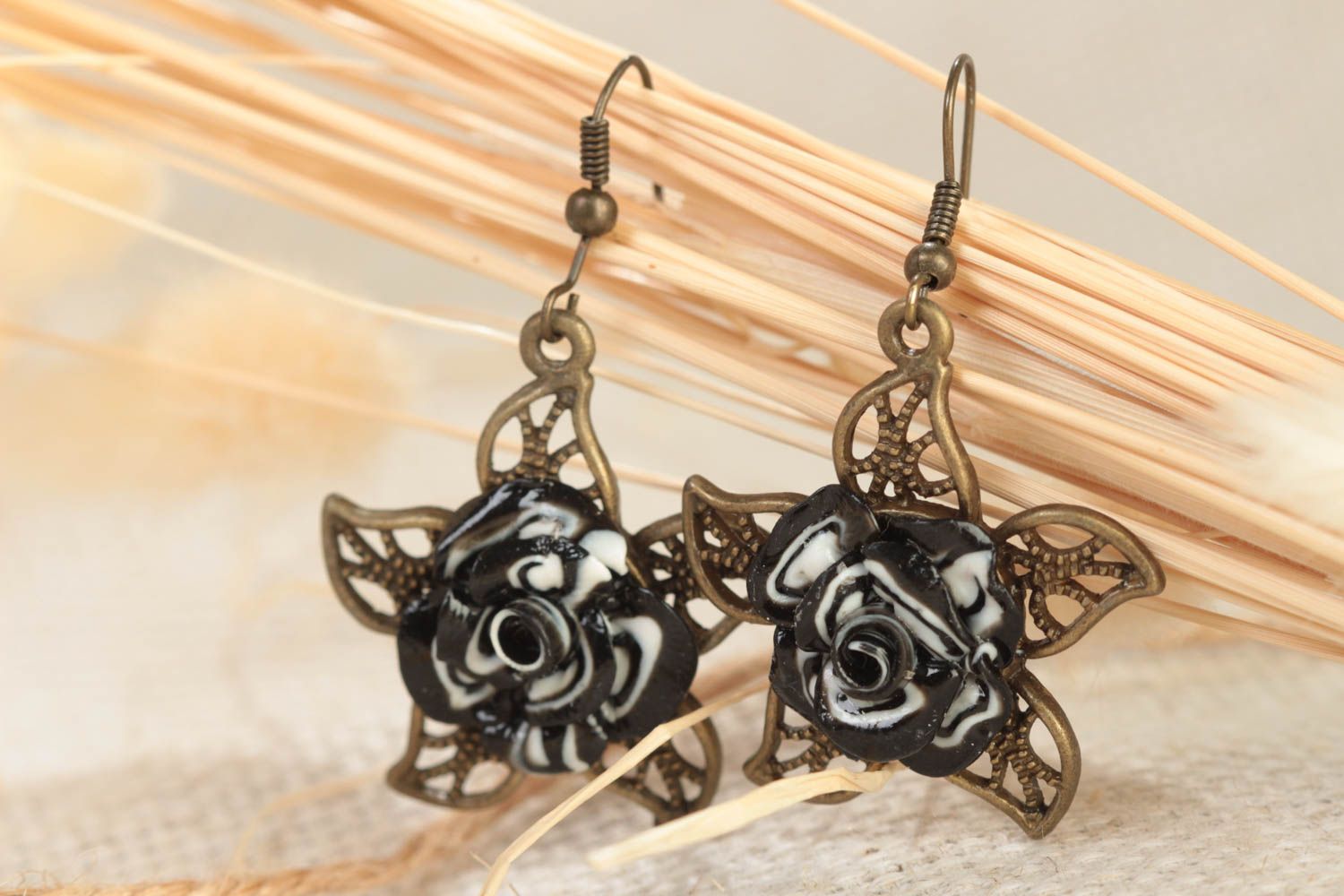 Handmade designer dangling earrings of bronze color with polymer clay flowers photo 1