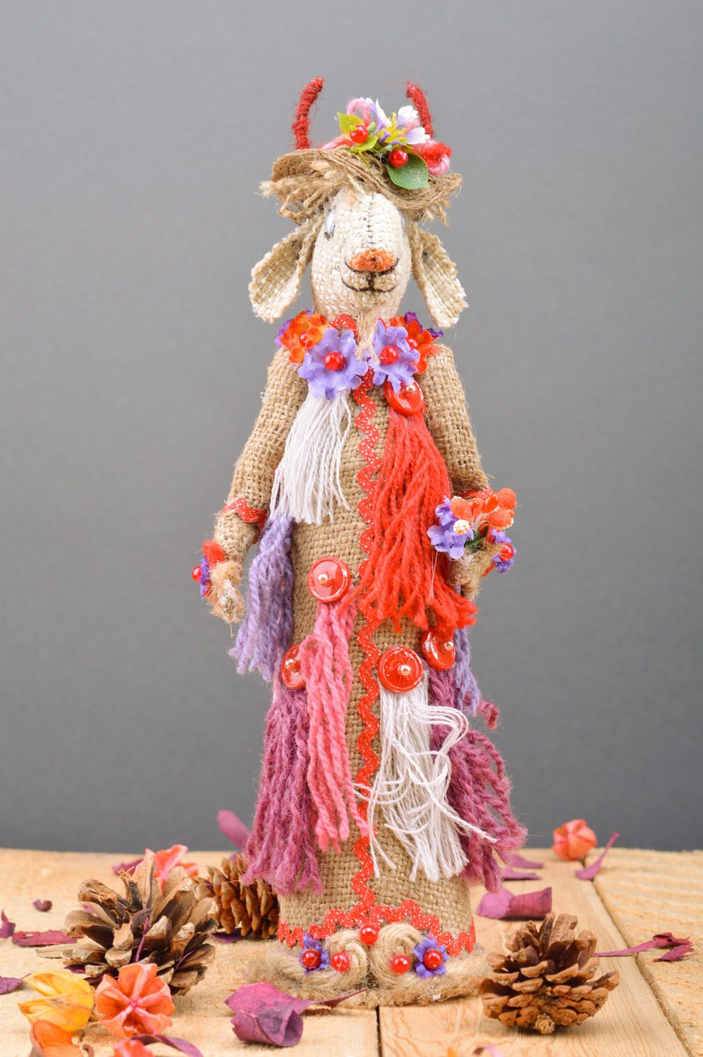 Handmade decorative bottle cozy sewn of burlap Goat in bright ethnic clothes photo 3