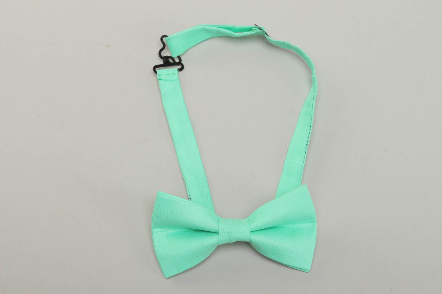 Cotton fabric bow tie of turquoise color photo 1