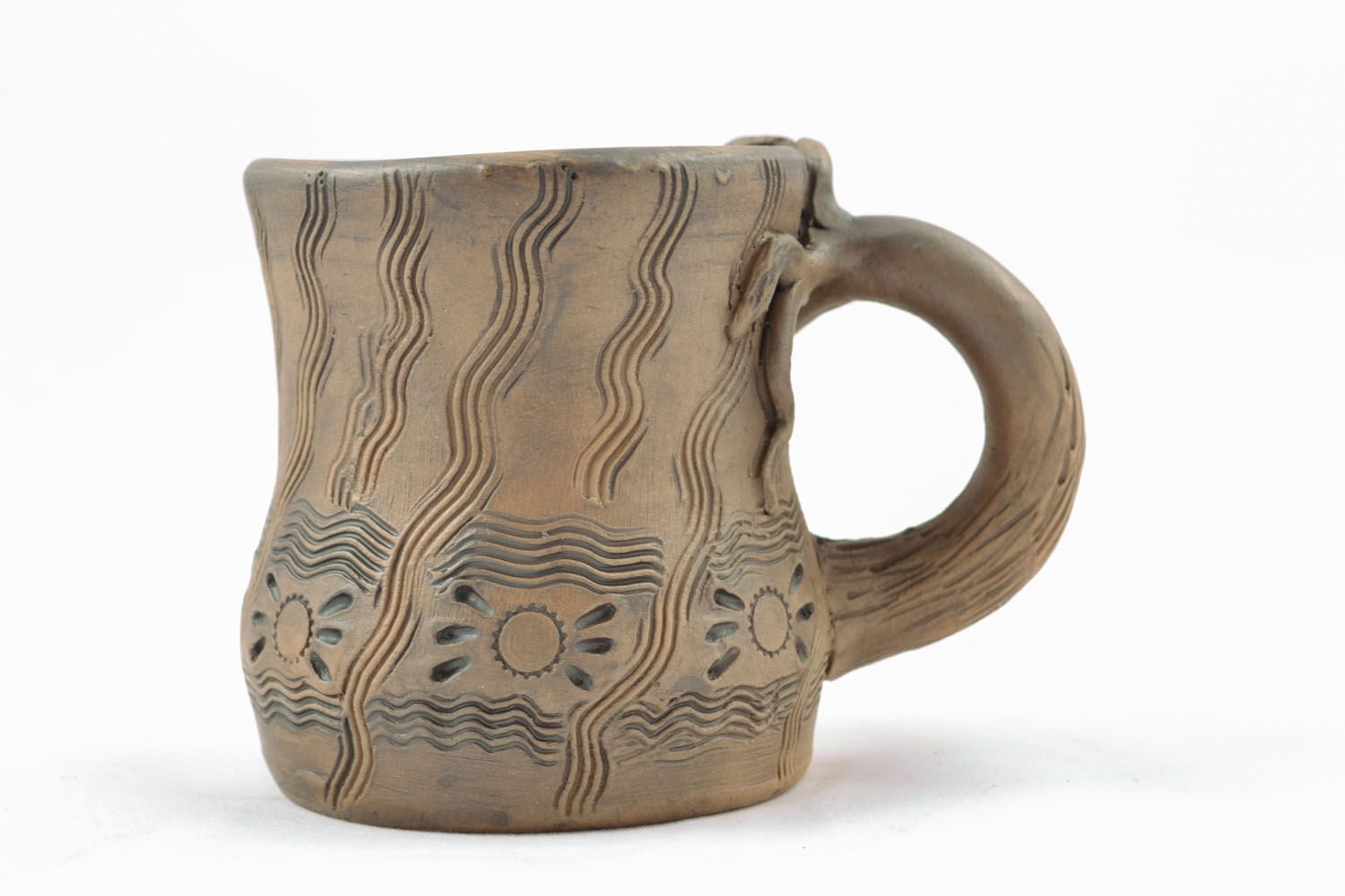 Clay mug with ornament photo 1