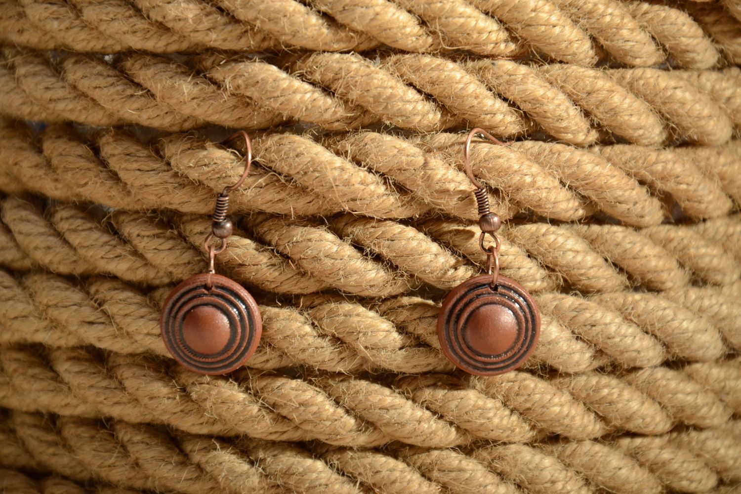 Tiny handmade dangle earrings molded of brown clay and painted with enamels photo 1