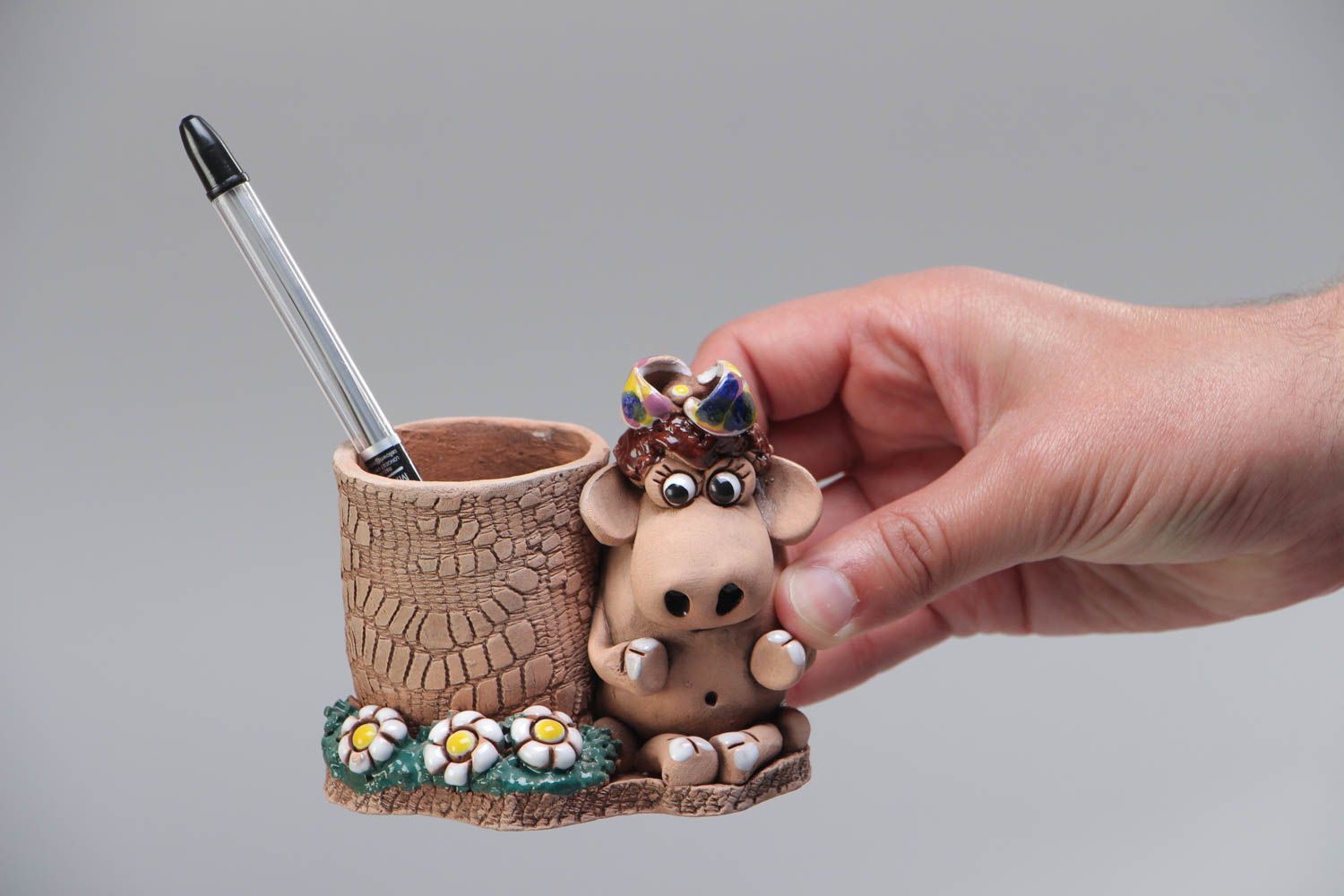Handmade interior beautiful ceramic stand for pens and pencils with funny cow figurine photo 4