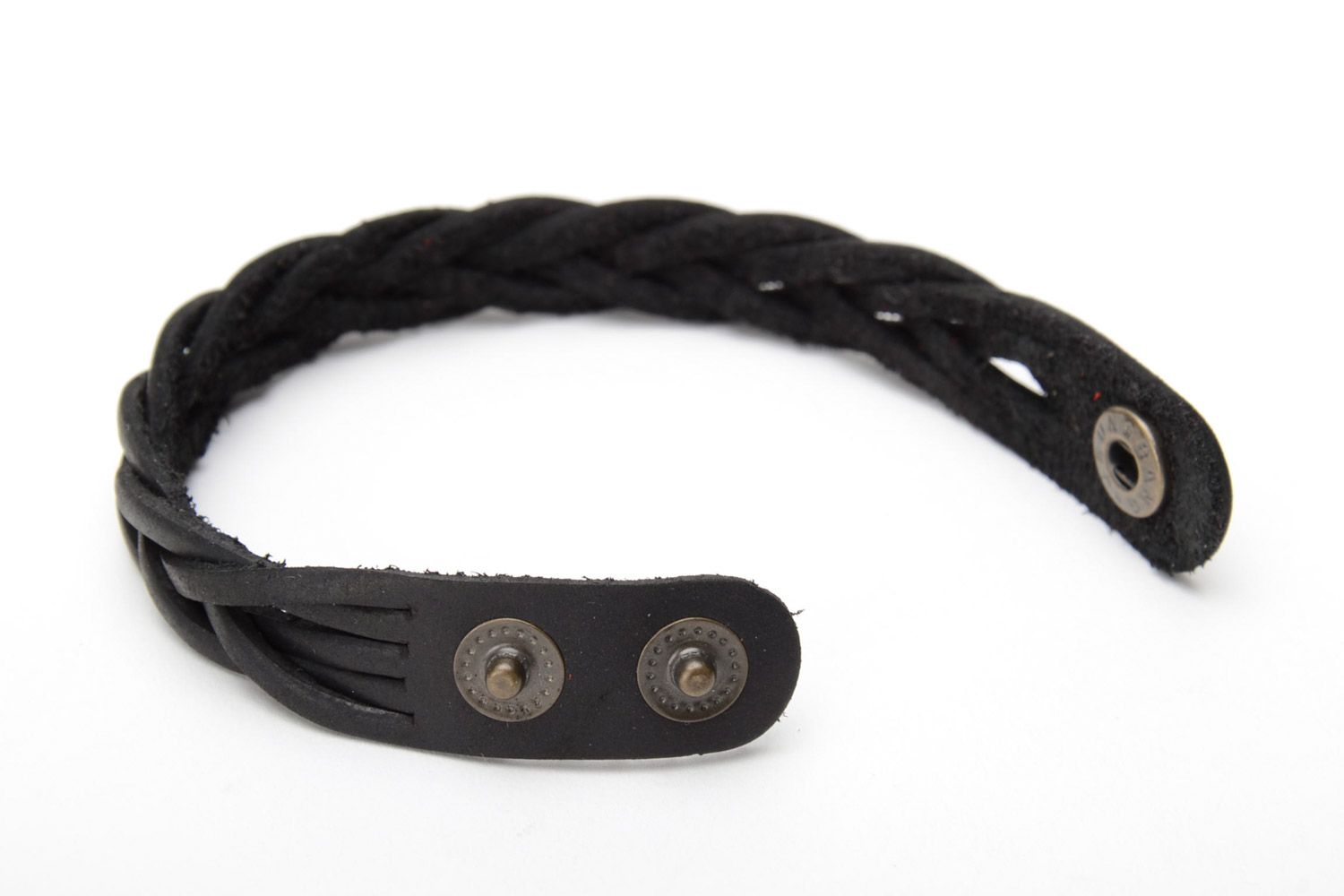 Thin handmade bracelet woven of black genuine leather with metal studs photo 4
