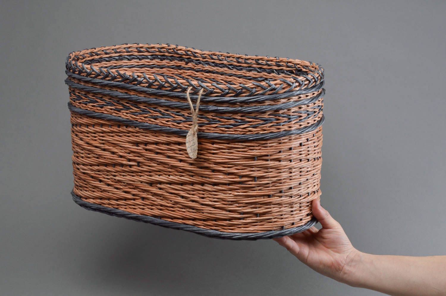 Handmade beautiful decorative basket woven of paper rod with patterned bottom photo 4