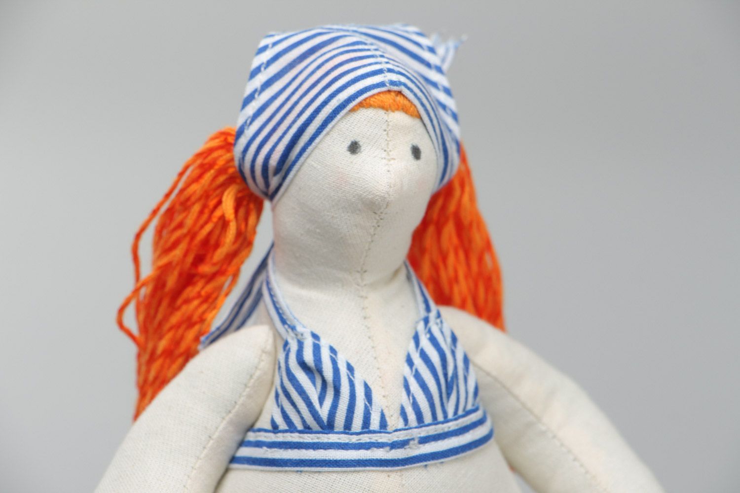 Handmade designer soft doll sewn of cotton with red hair in blue swimming suit photo 3
