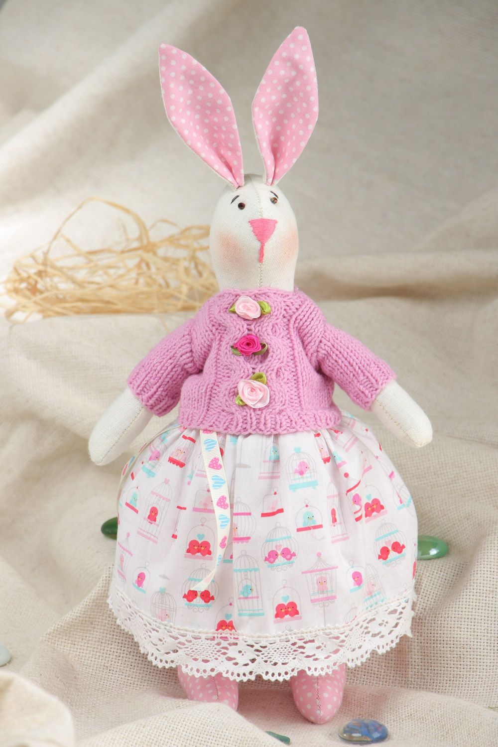 Funny handmade soft toy rabbit in pink knit jacket and floral skirt for kids photo 1