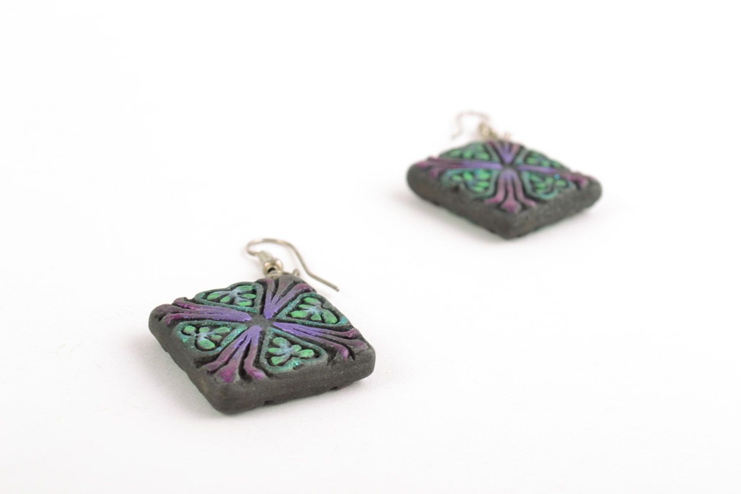 Handmade ceramic rhombus-shaped dangling earrings of black color with ornament photo 3