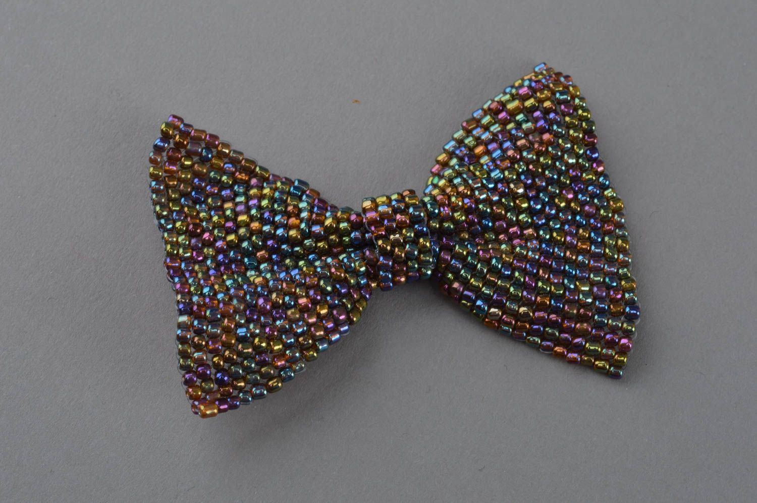 Fancy stylish handmade multicolor beaded brooch in the form of a bow photo 2