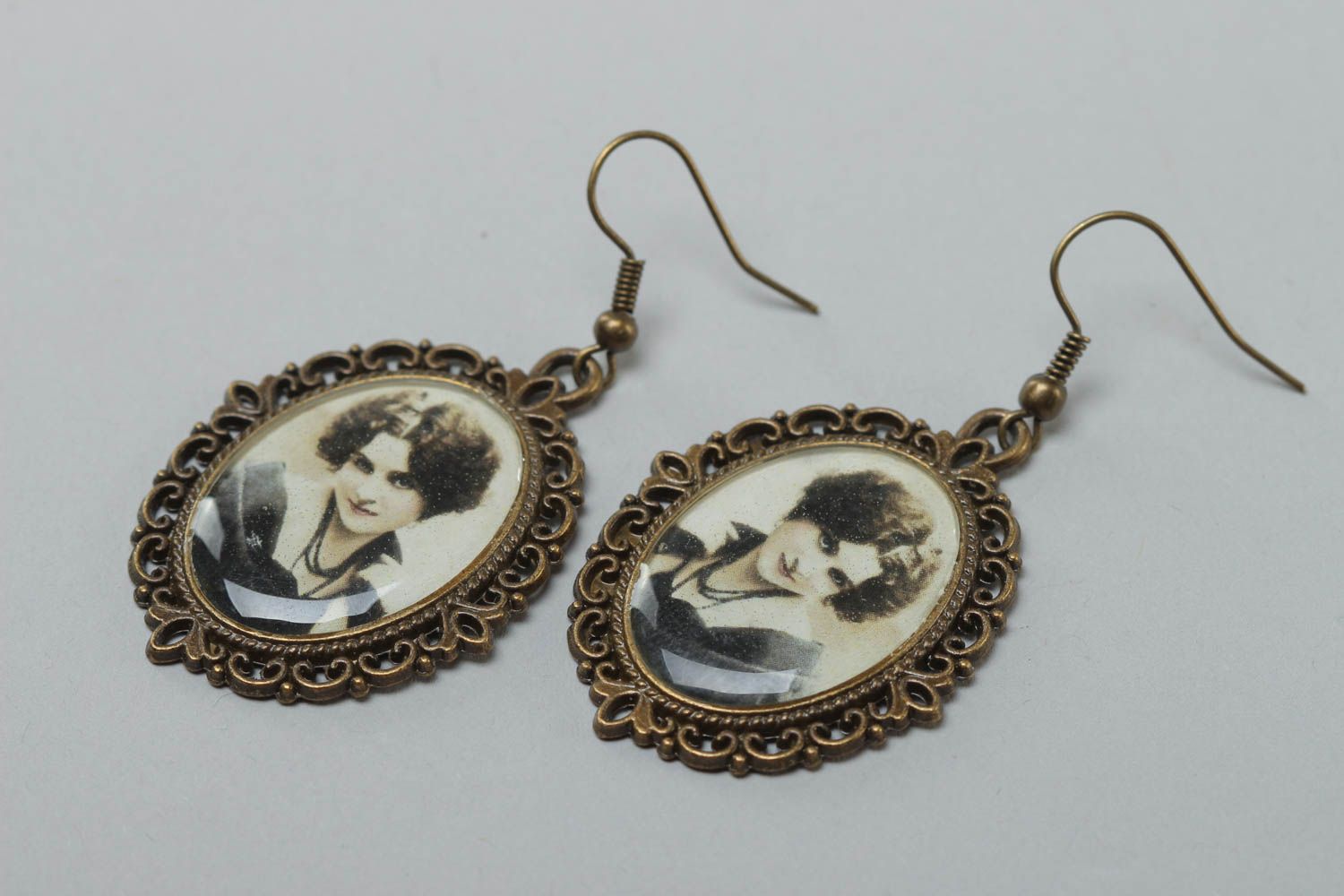 Egg-shaped vintage handmade earrings made of glass glaze with a portrait of a woman photo 2