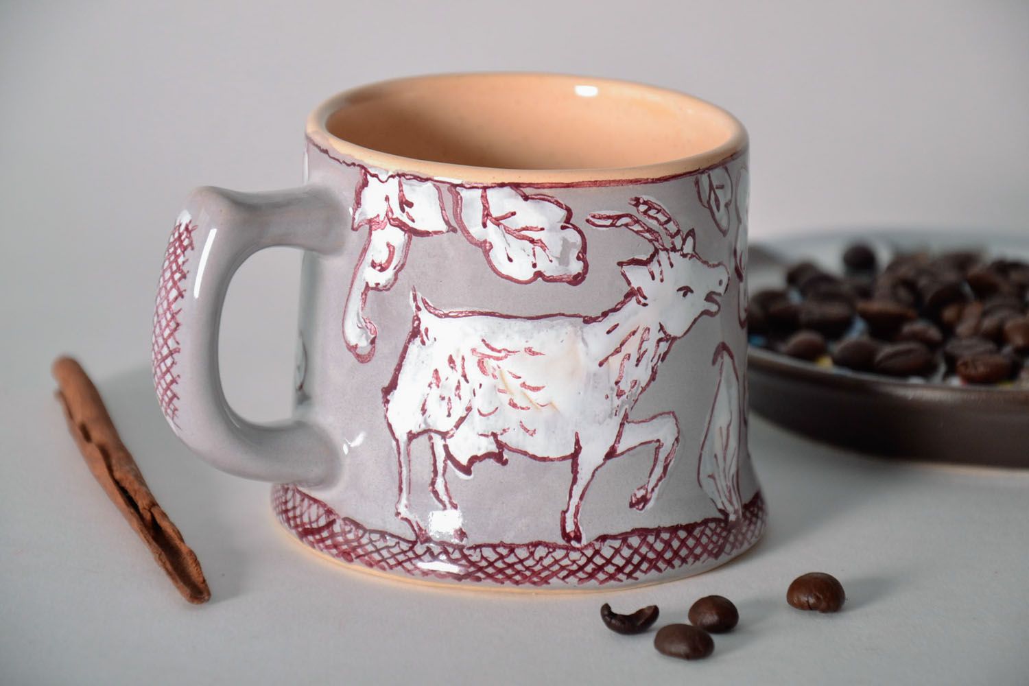 Clay glazed porcelain grey, cherry, white cup with goat pattern photo 1