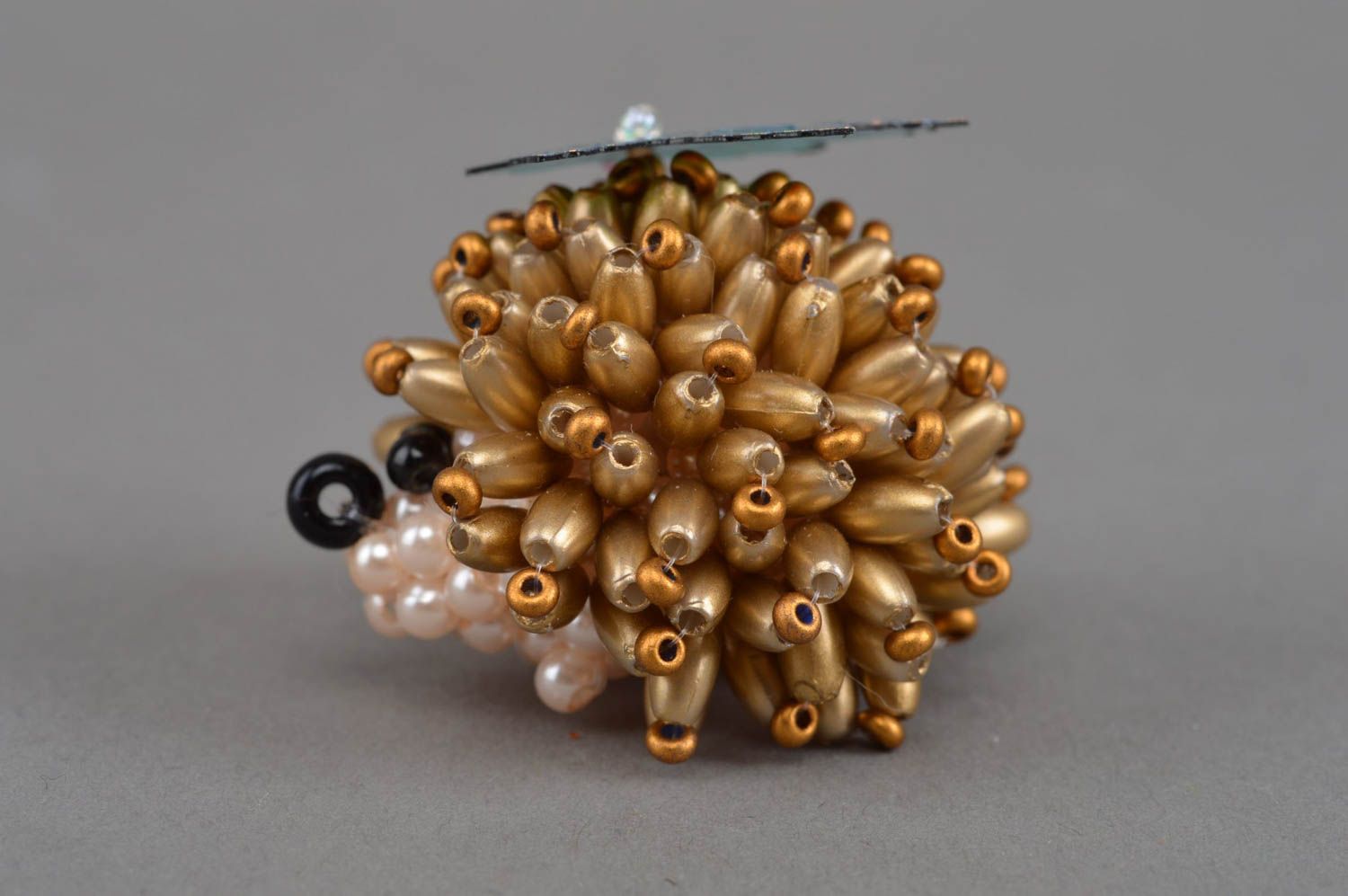 Small decorative designer handmade beaded animal figurine of golden hedgehog  photo 3