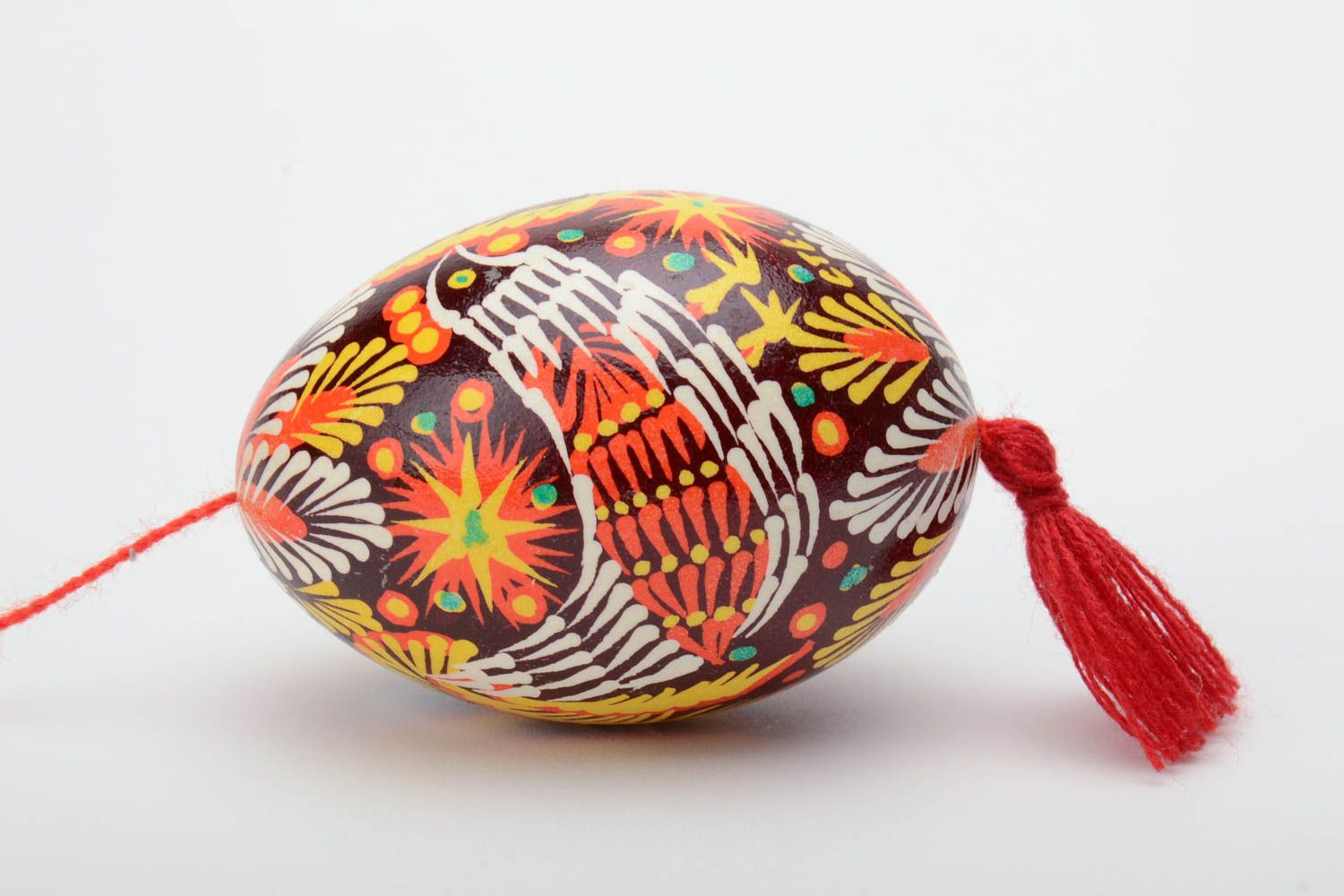 Handmade decorative painted Easter egg ornamented in Lemkiv style with red tassel photo 3