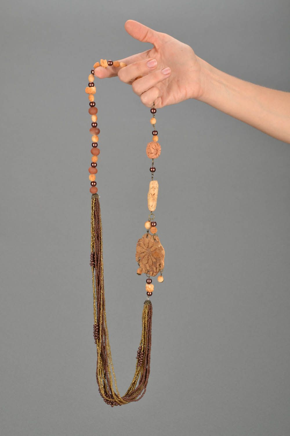 Necklace made of natural clay and beads photo 2