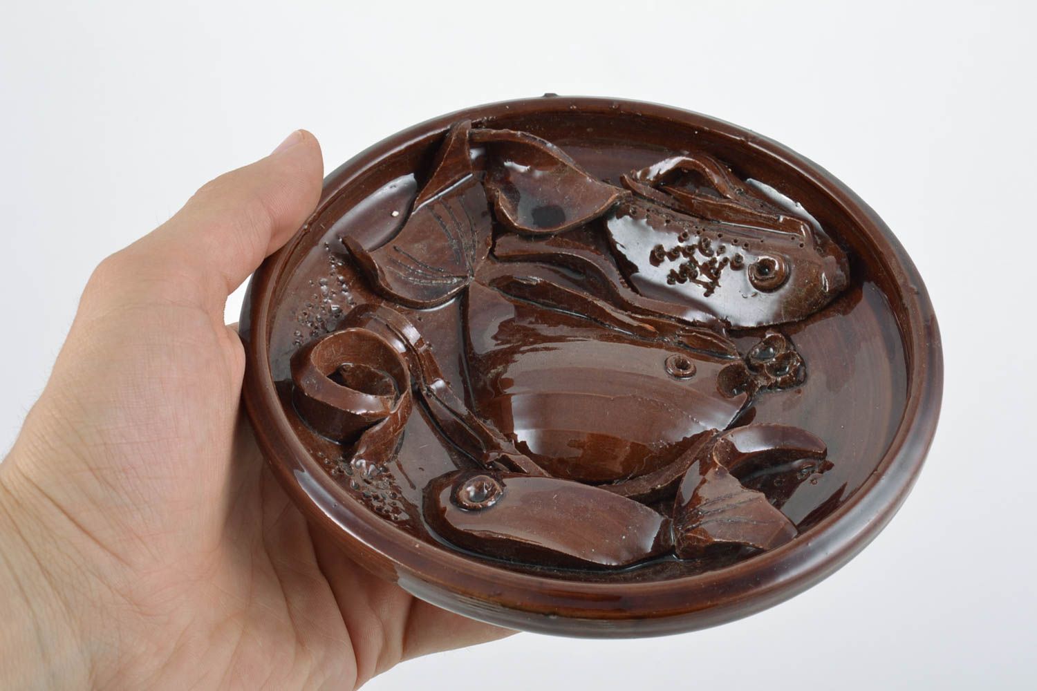 Beautiful handmade decorative relief molded clay wall plate of brown color photo 2