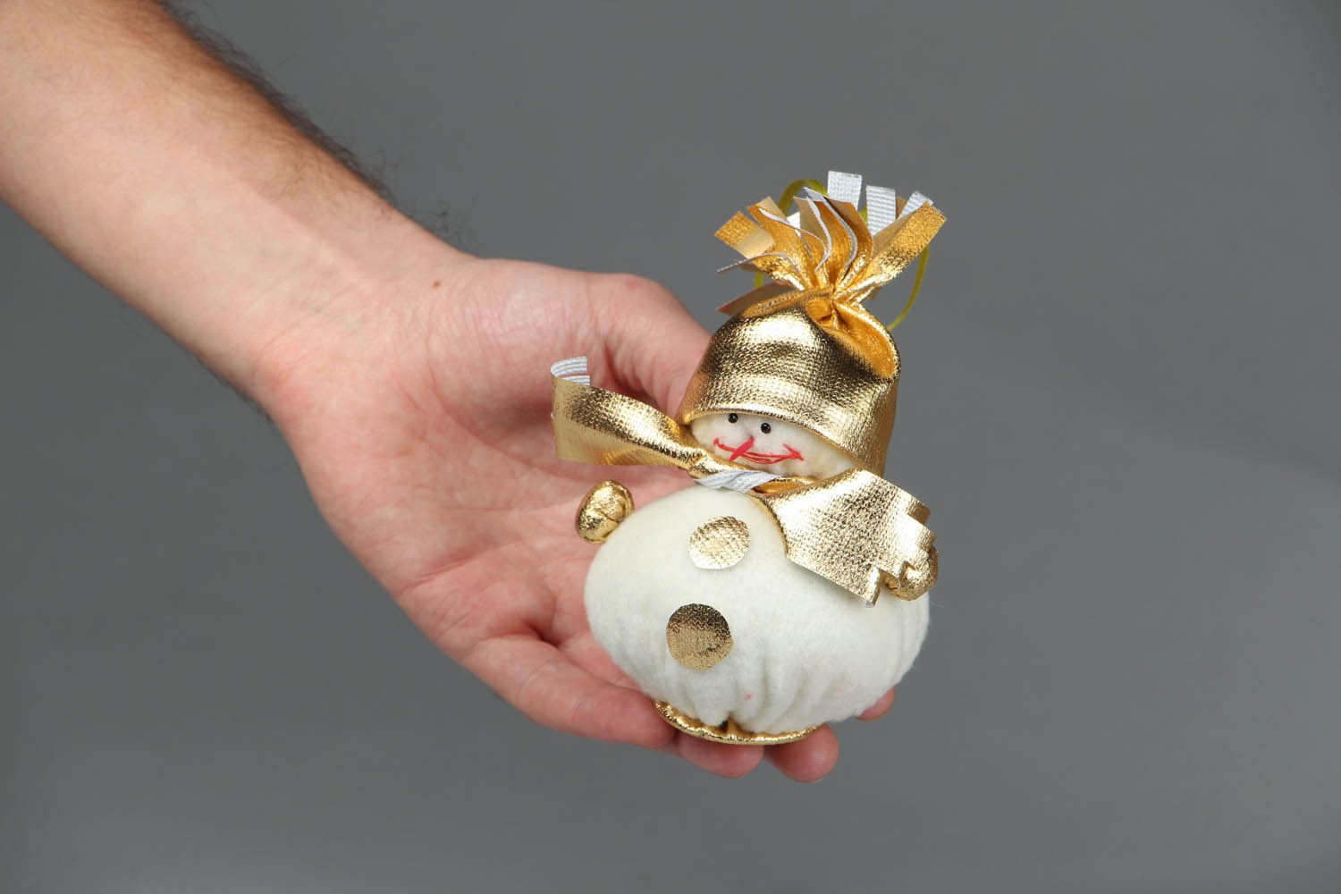 Snowman of beige and golden color photo 4