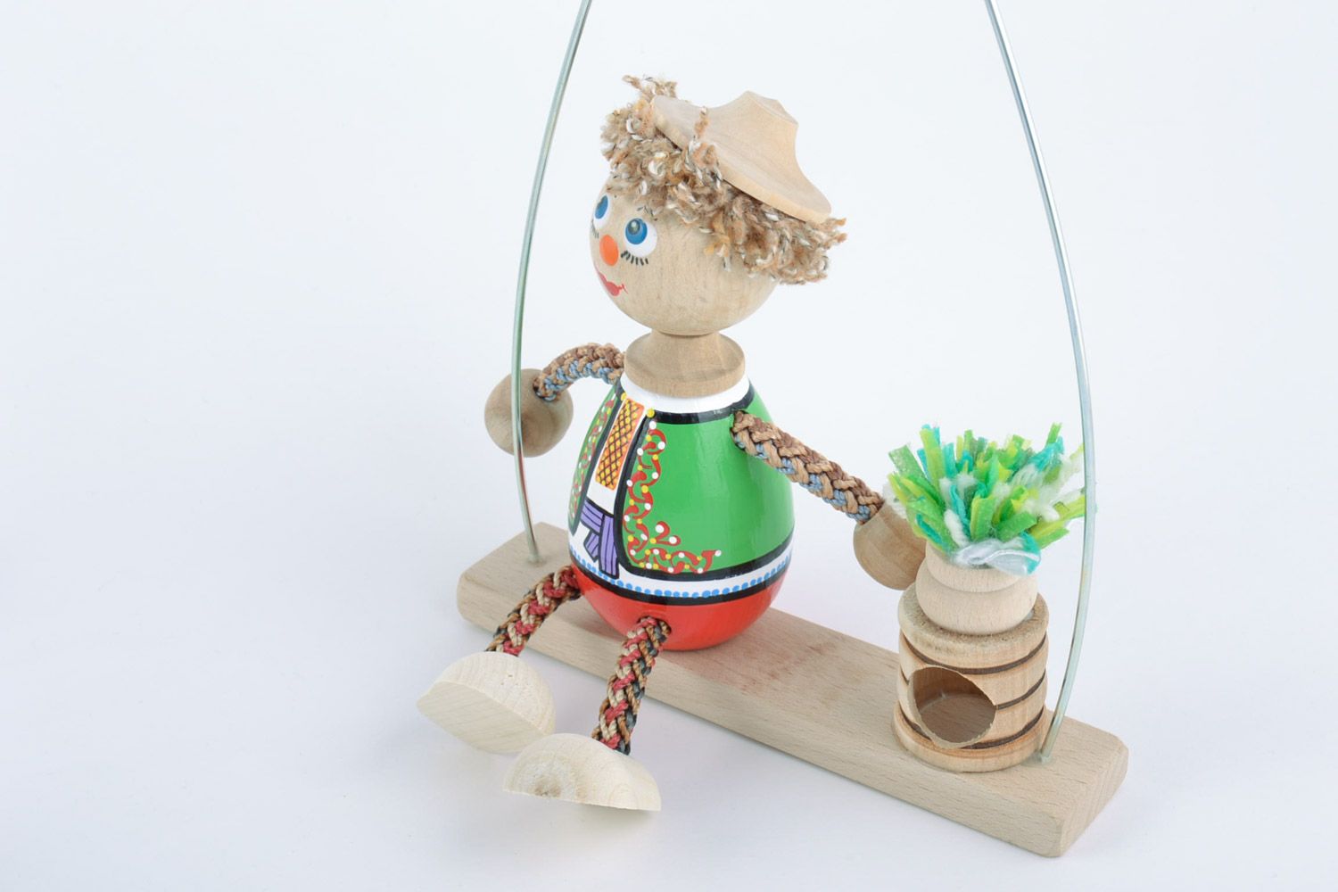 Handmade painted wooden eco toy boy in Ukrainian costume on swing for kids photo 4