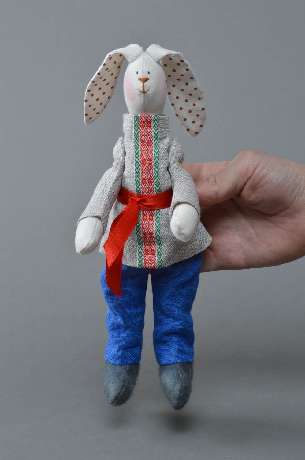 Handmade linen fabric soft toy rabbit in blue trousers and ethnic shirt with belt photo 4