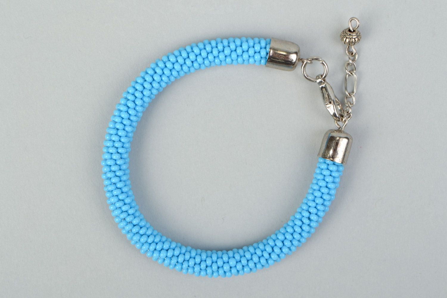 Handmade designer wrist bracelet crocheted of blue Czech beads for women photo 2