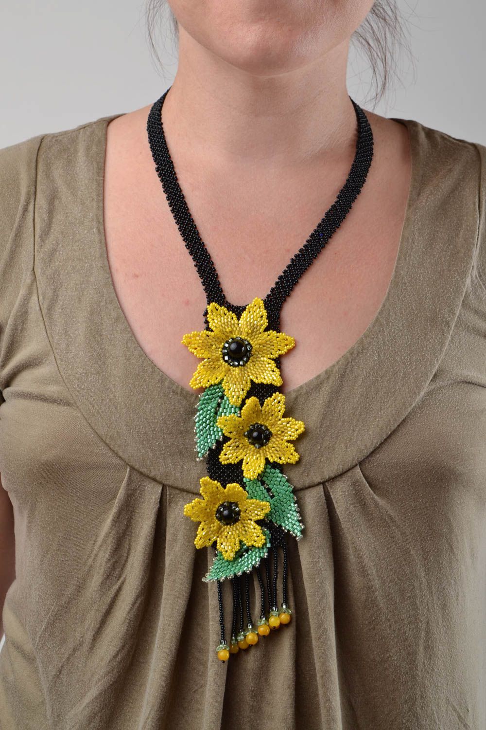 Bead black pendant with yellow sunflowers handmade long designer accessory photo 1