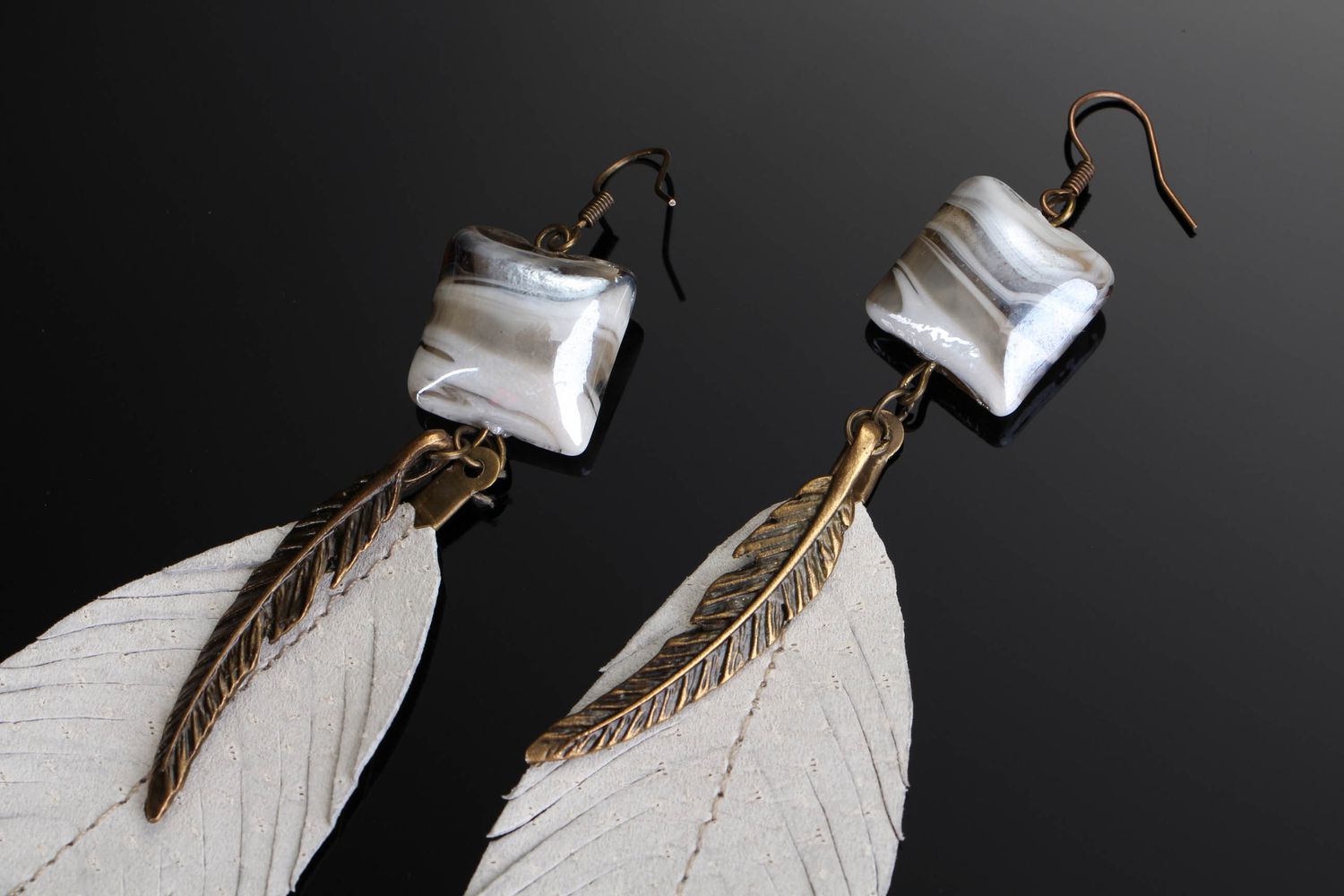 Long earrings with white feather photo 3