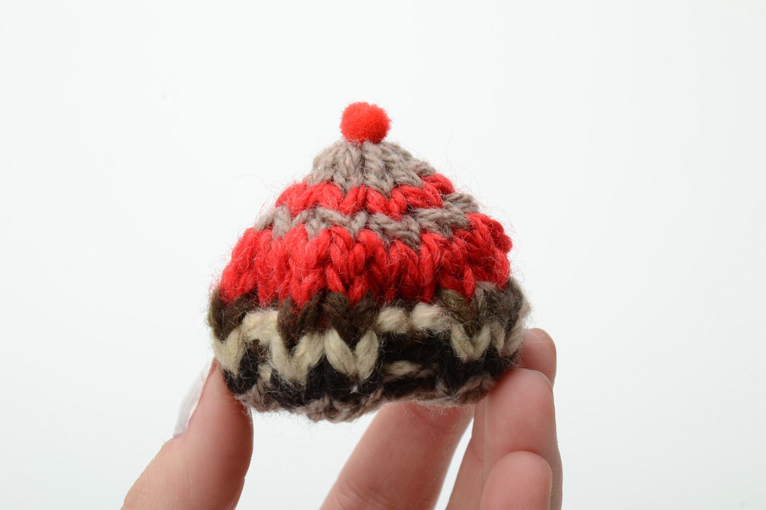Knitted red hat for a baby toy. Two inches in diameter photo 5