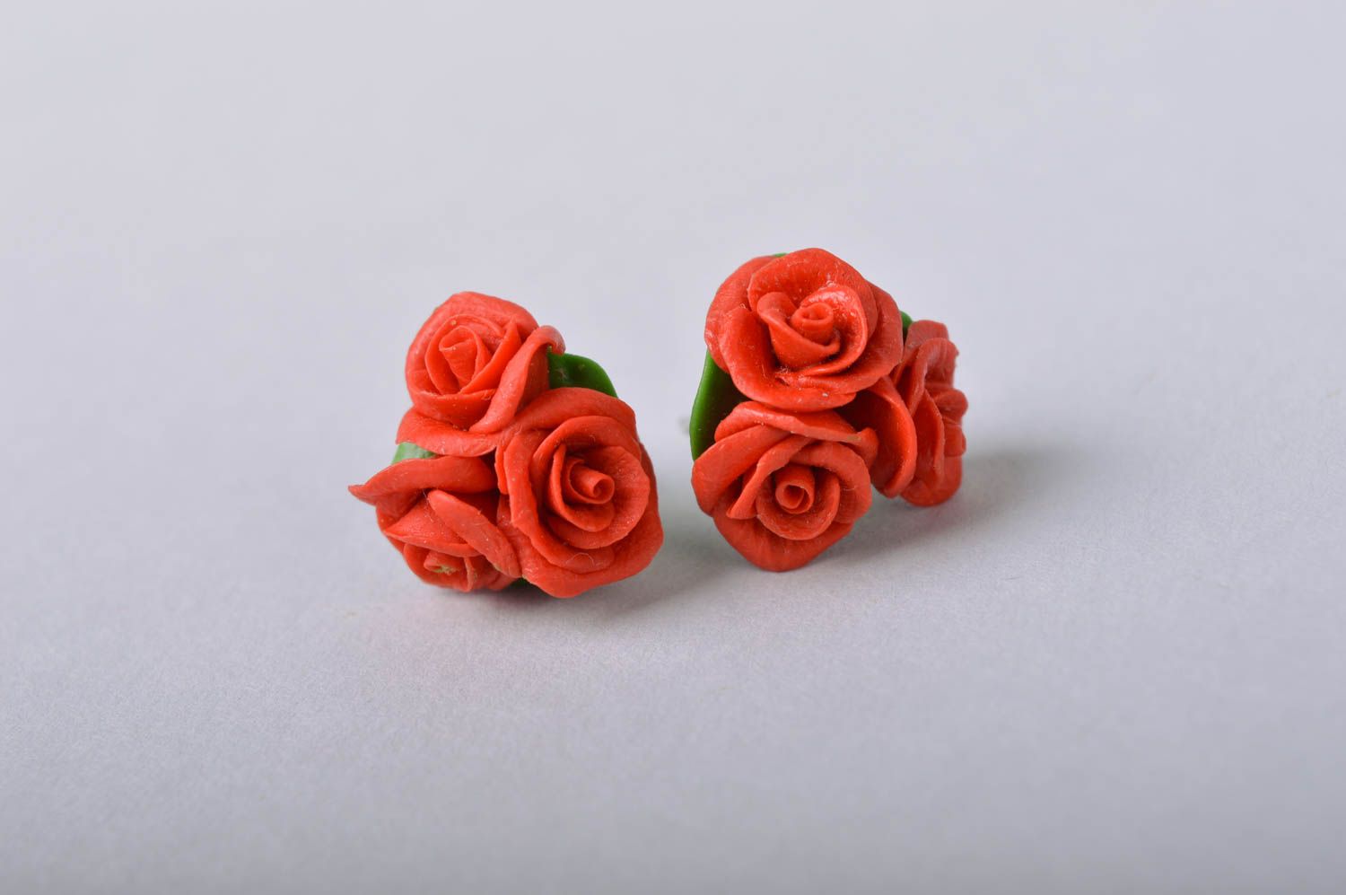 Handmade flower stud earrings made of cold porcelain in shape of red roses photo 4